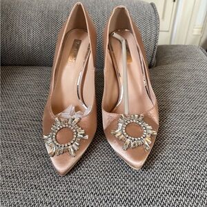 Never wore heel but there is a dent on the left heel please see picture